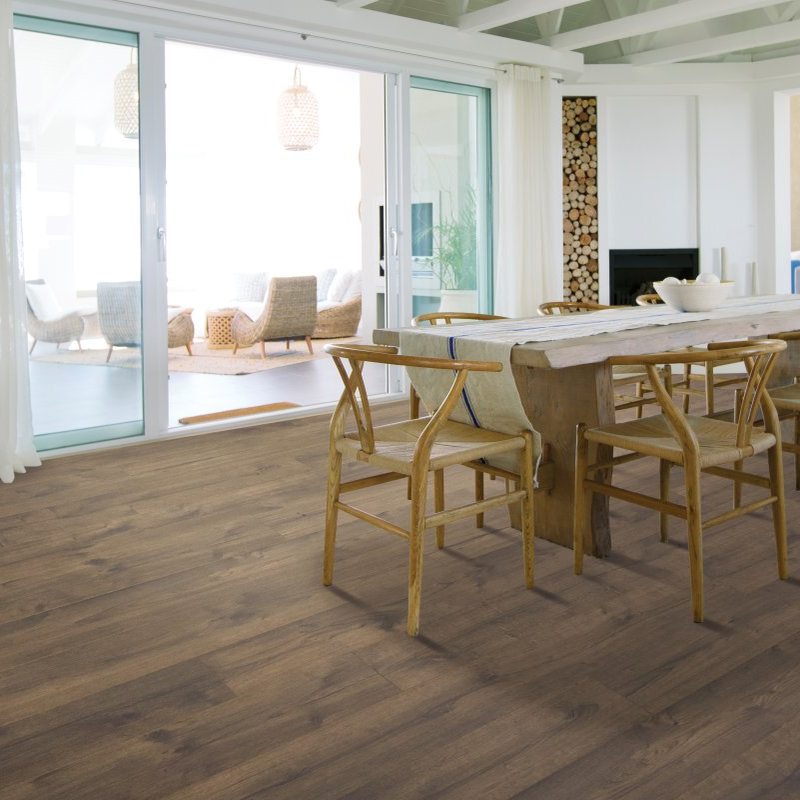 Living room with laminate flooring- Briarfield- Tanned Oak